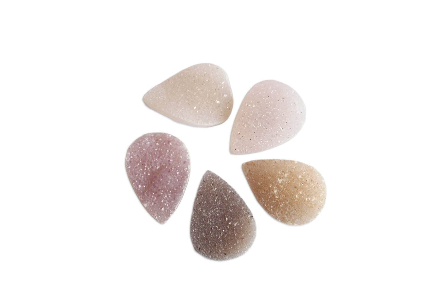 5 Druzy Cabochons in a circle laid on a table