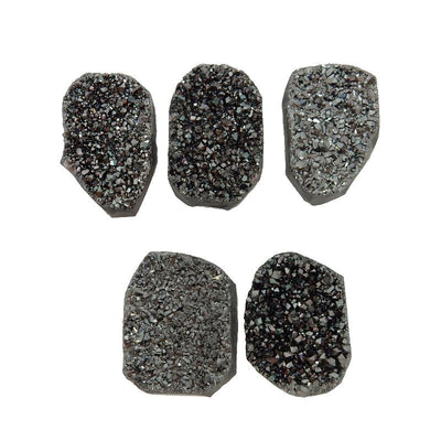 5 black titanium druzy clusters on white background