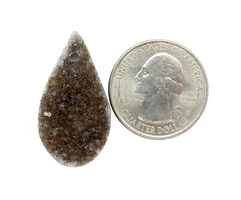 druzy drilled teardrop bead next to a quarter for size reference