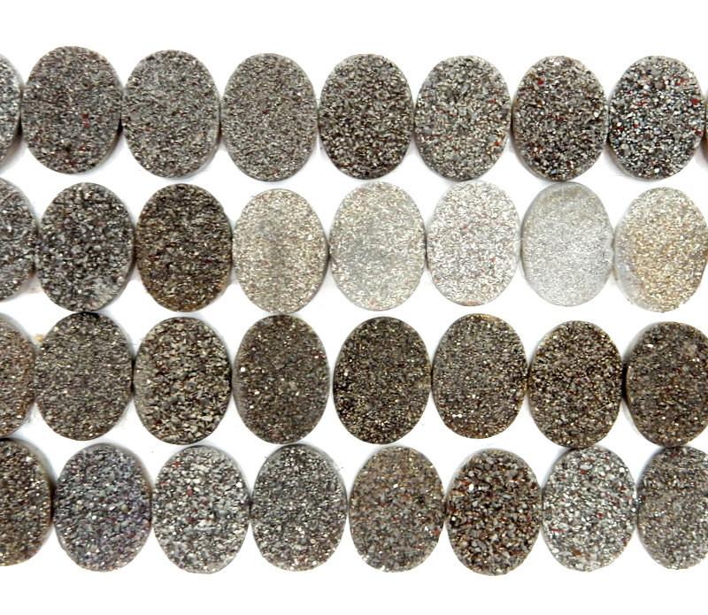 multiple black diamond cabochons displayed to show the slight differences in the color shades 