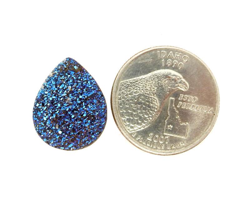 Blue Teardrop Shaped Druzy Cabochon next to quarter for size reference