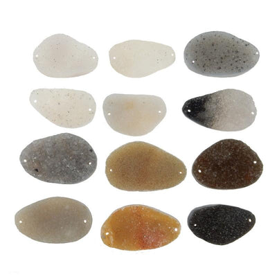 12 assorted druzy cabachons to show they vary in color from white, gray, black, brown, tan, orange, purple.  They have a drill hole on each side.