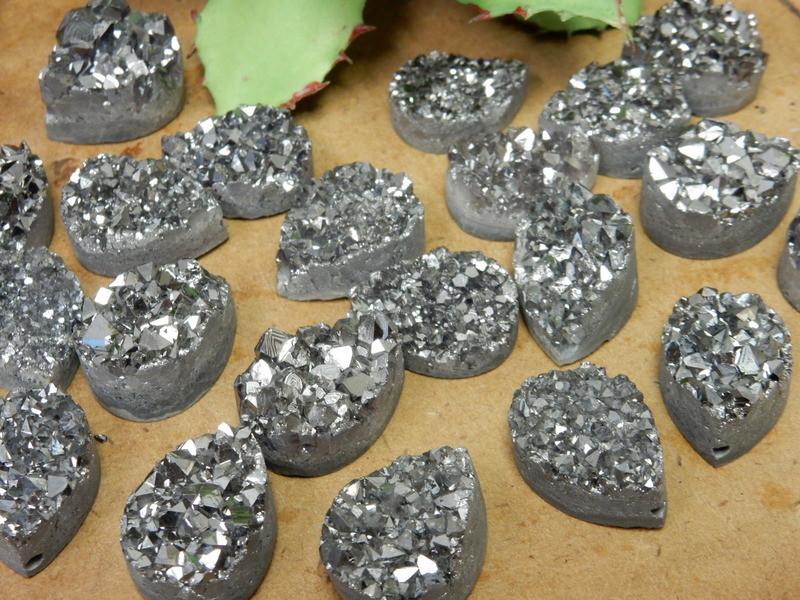 Various Titanium Treated Platinum Druzy Cabochon Top Drilled not all the way through For Bail displayed to show textures color thickness reference