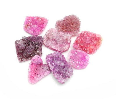 druzy cabochons with decorations in the background