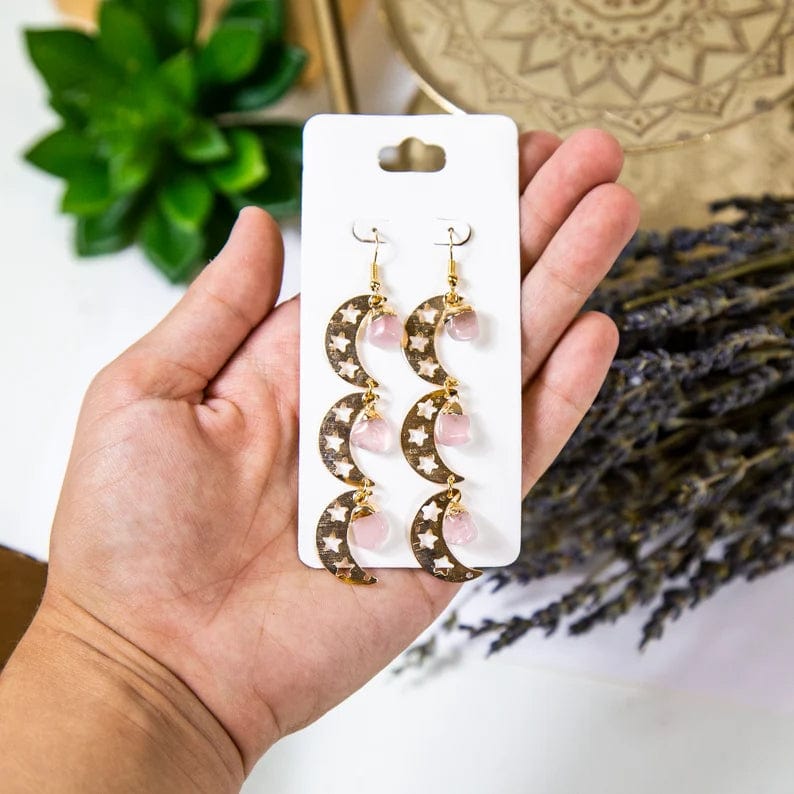 Triple Moon with Gemstones Earrings with Rose Quartz stones and Electroplated Gold Finish in a hand for size reference