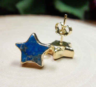 front and side view of the turquoise star stud earrings 