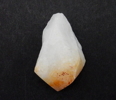 1 piece of Extra Large Citrine Point on black background.