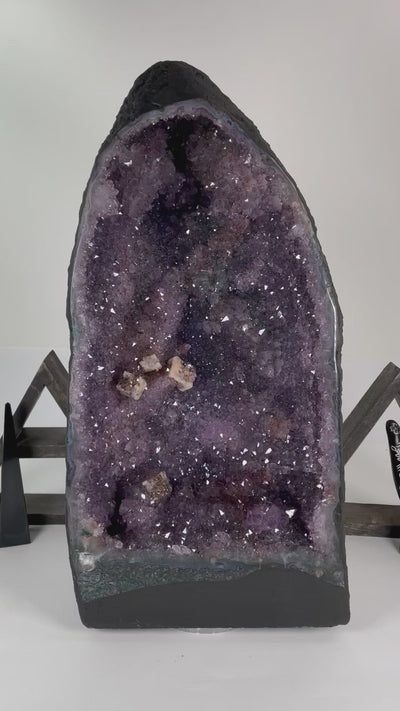 bottom to top close up video of amethyst cave geode for details