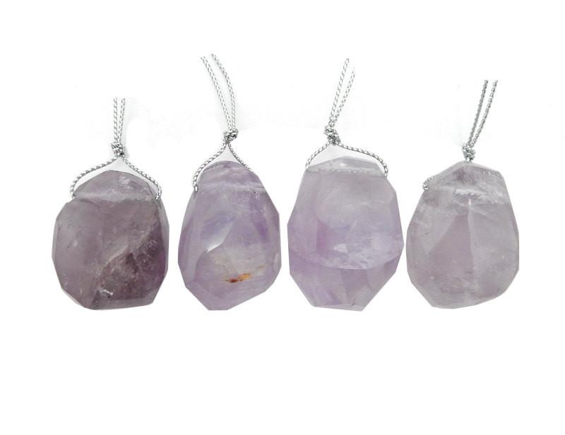 4 Faceted Amethyst Bead Top Side Drilled Large Bead on white background.
