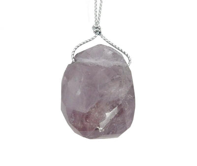 A piece of Amethyst Bead on white background.