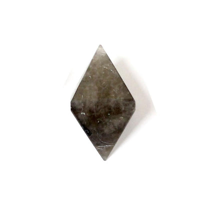 close up of one smokey quartz diamond point on white background for details