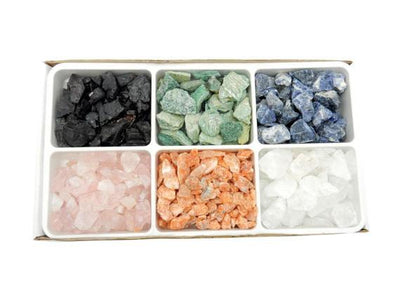 Box of rough stone mixes crystals