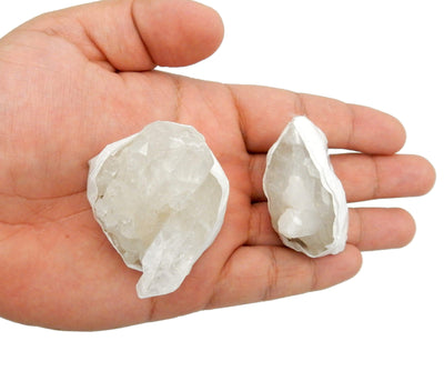 Crystal Quartz Clusters in a hand for size reference