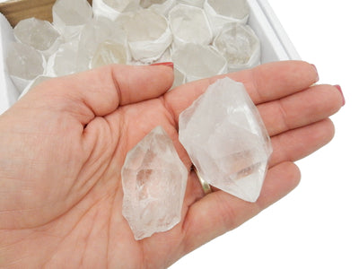2 Crystal Quartz Points in a hand