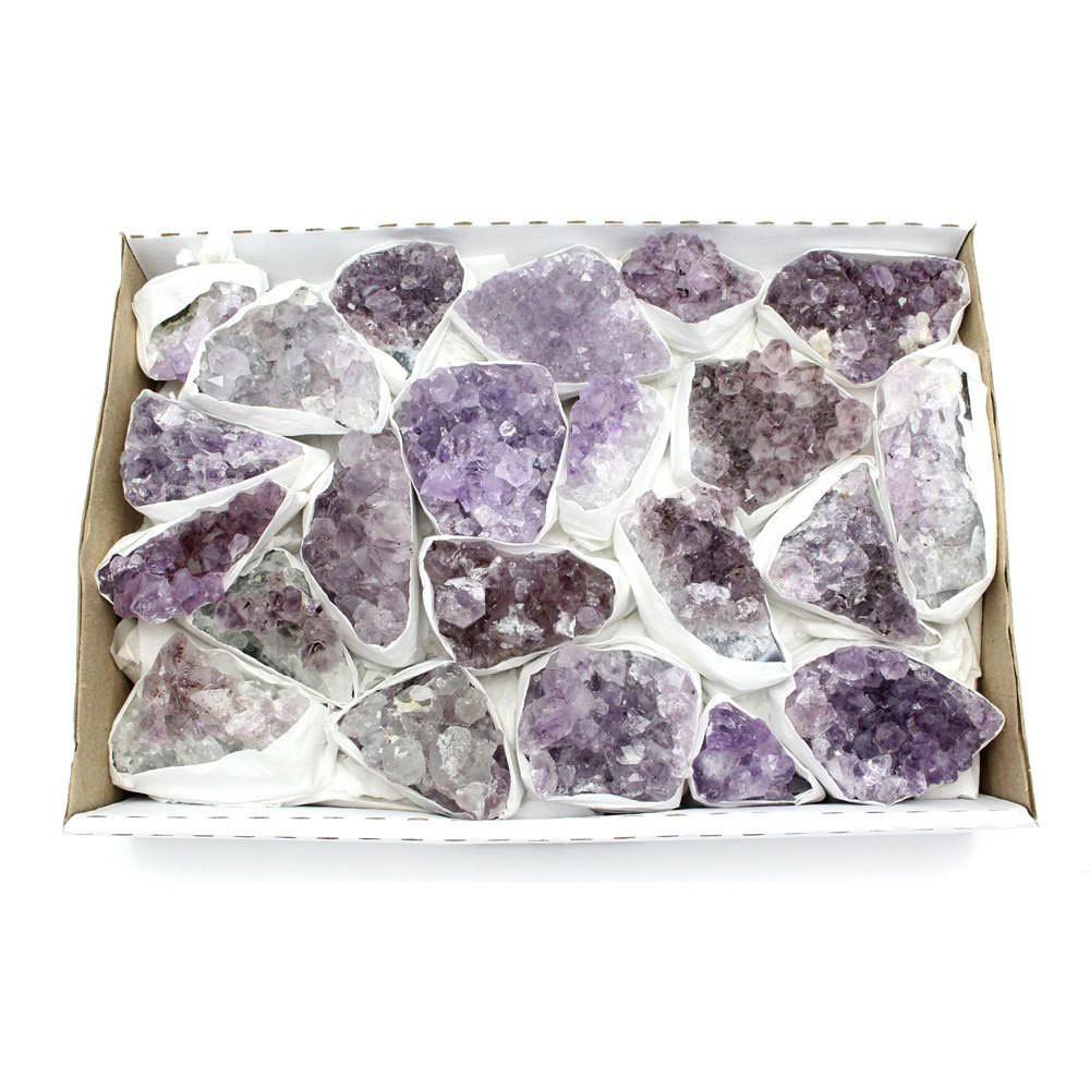 box of light amethyst clusters open