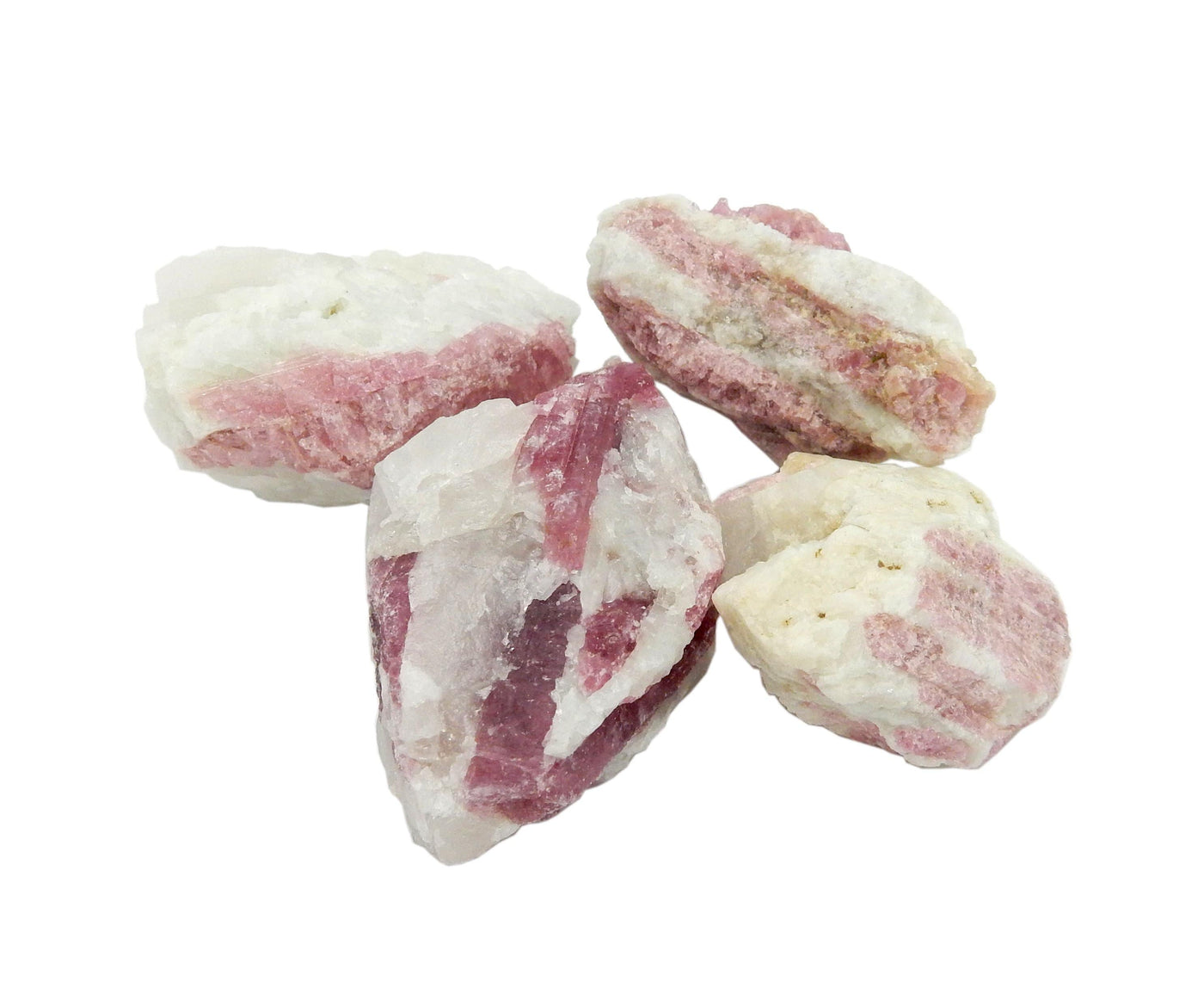 4 pink tourmaline stones showing varying color and shapes of stones