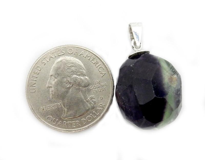 Fluorite Pendant next to quarter for size reference