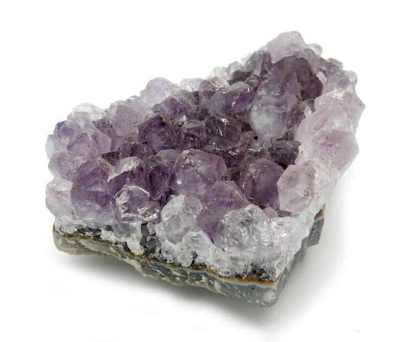 up close shot of Freeform Amethyst Cluster With Magnet on white background