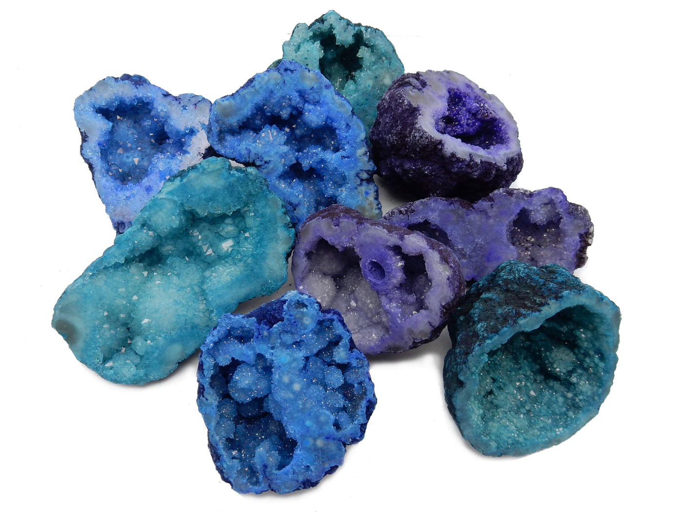 assorted Large Geode Halves on a table showing ranges in size and shape