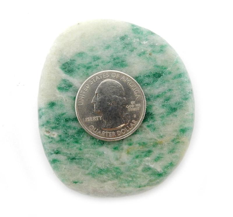 Green Jade Large Palm Stone with a quarter on it