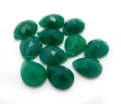 side view of green onyx faceted beads for thickness reference