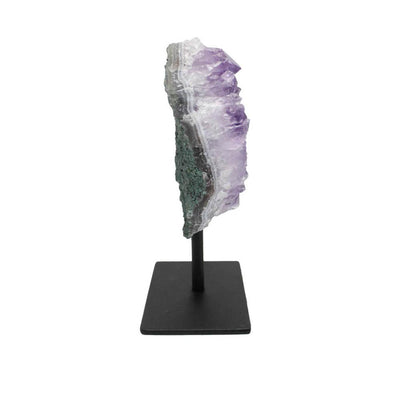 side view of One amethyst cluster on a black metal stand on a white background.