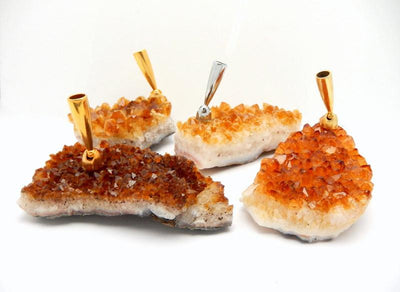 4 citrine cluster pen holders on a white background.