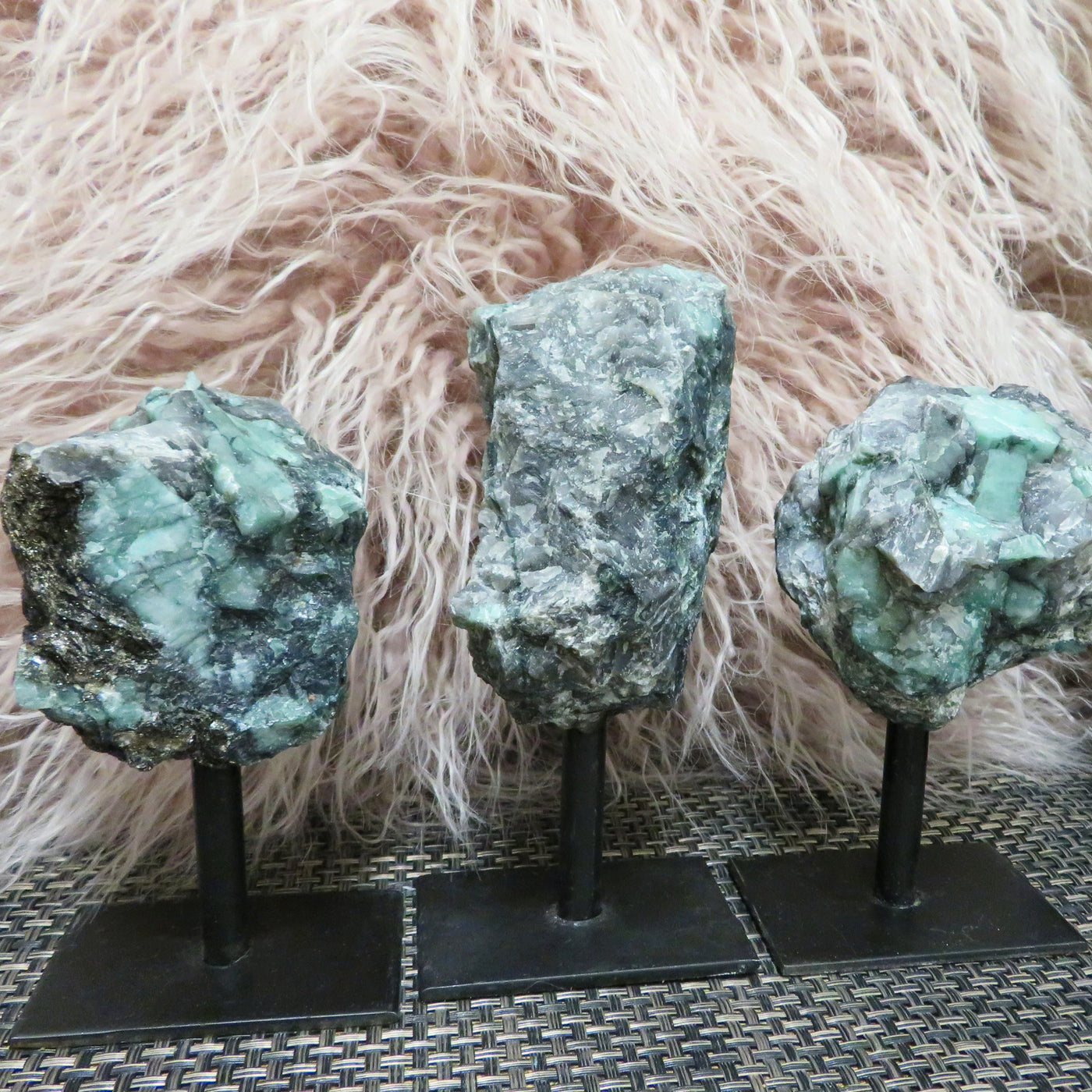3 Emerald on metal stand line up 