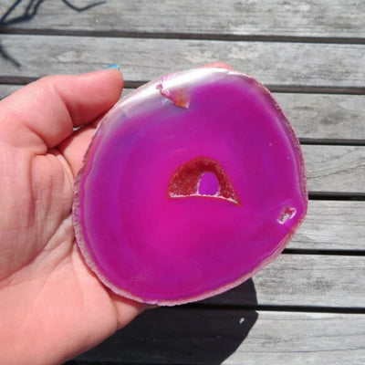 one of the set of Pink Agate Slices Druzy Center i a hand