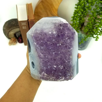 Amethyst  Druzy Polished Point in a hand showing front view