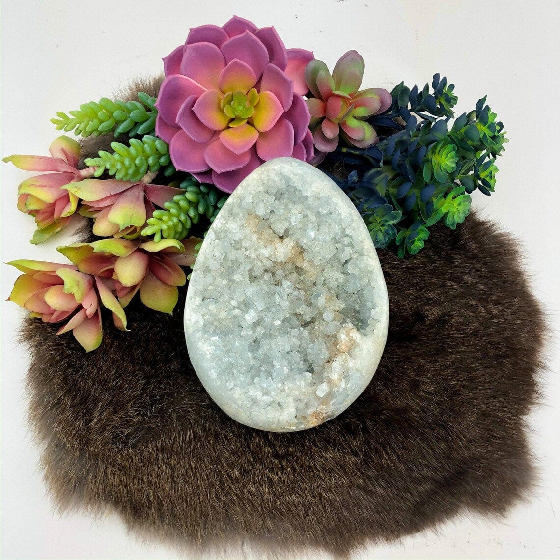 Celestine Egg Shaped Crystal Stone on display