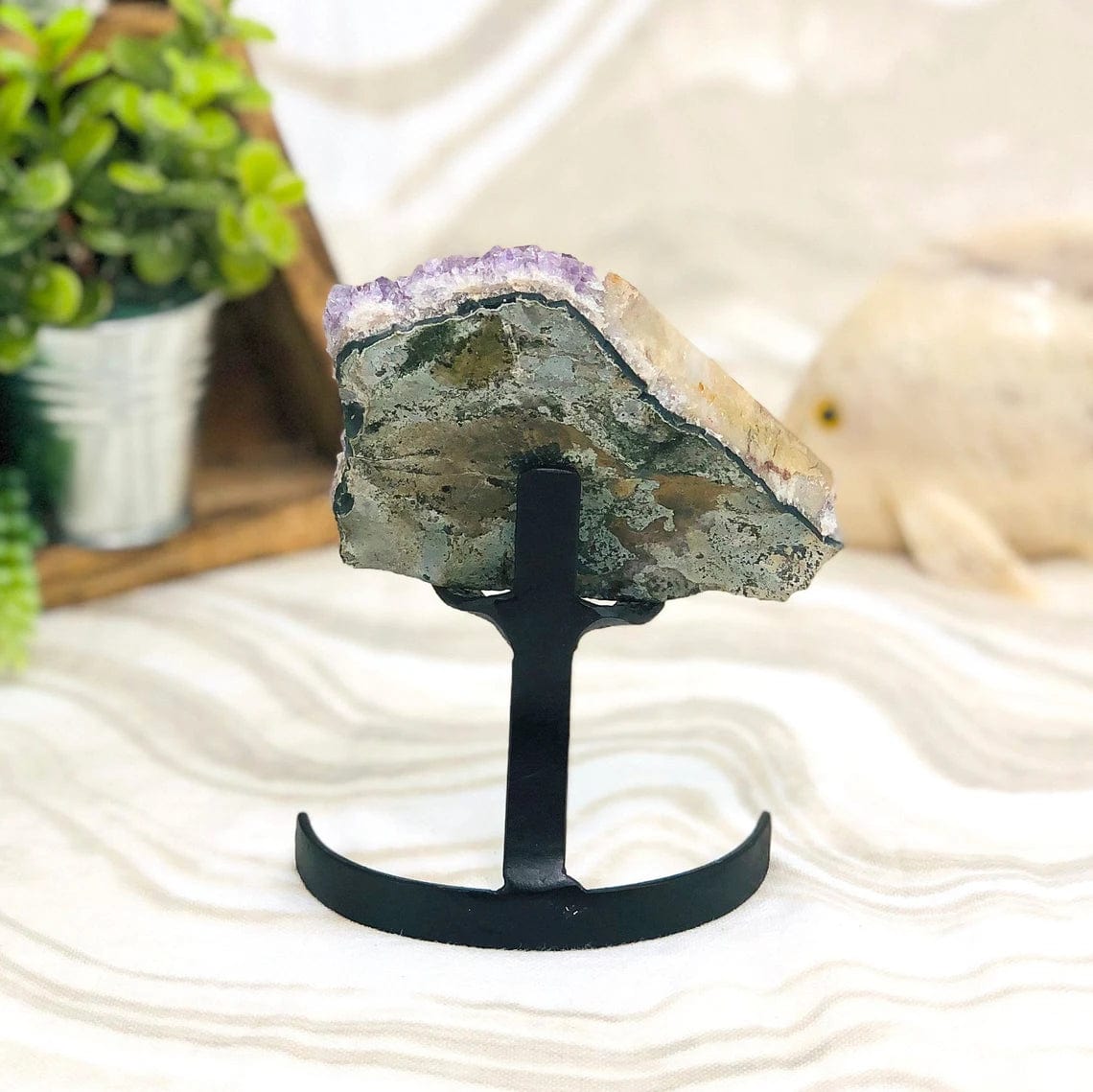 Amethyst Crystal Purple Geode With Calcite on Metal Stand from back view