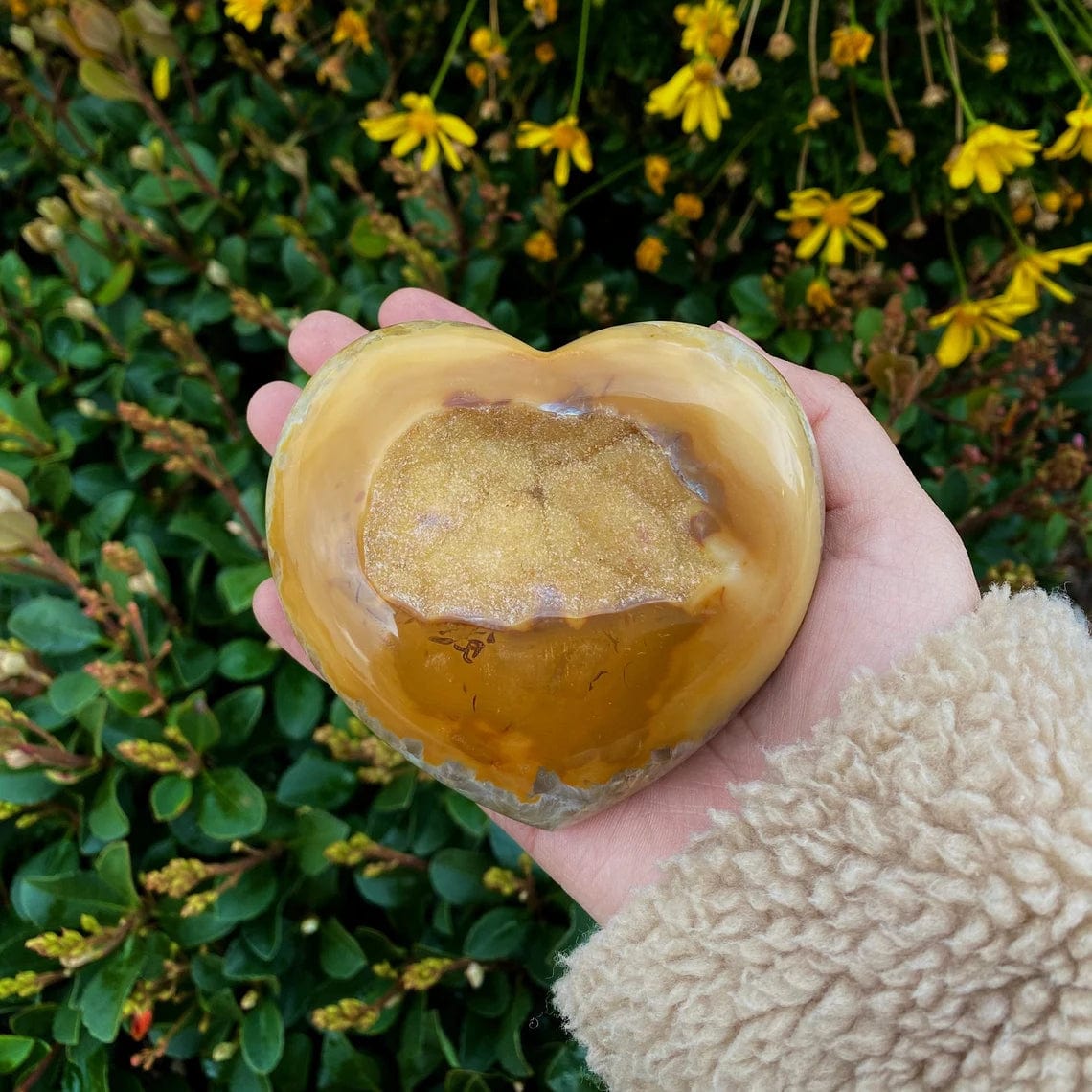 Natural Agate Druzy Heart Shaped Stone in a hand for size reference