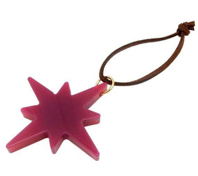 Picture of pink agate star, displayed on a white back ground.