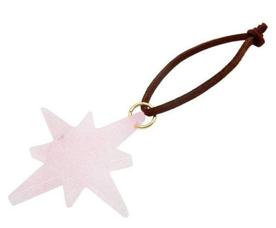 Picture of rose quartz agate star, displayed on a white back ground.