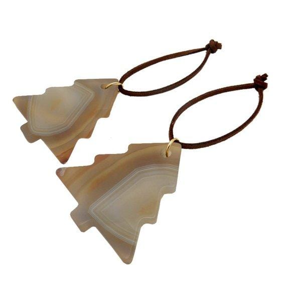 Picture of 2 of our natural agate tree Christmas ornaments, on a white background.  
