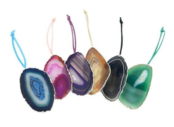multiple agate ornaments displayed to show the differences in the colors and patterns 
