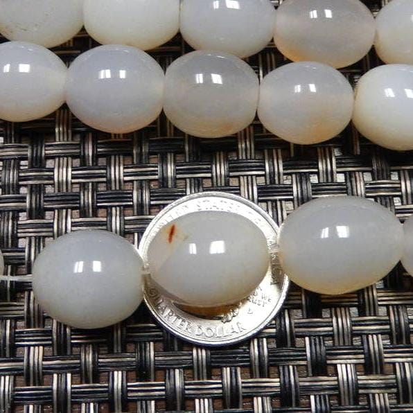 White Agate Egg Shaped Beads , one on a quarter for size reference
