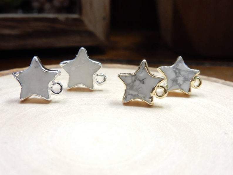 one pair of silver and white and one pair of gold and white howlite stud earrings