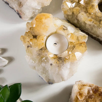 Citrine Candle Holder Clusters with a candle in it