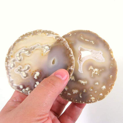 Natural Druzy Agate Slices - 2 pc set - held in a hand fanned out