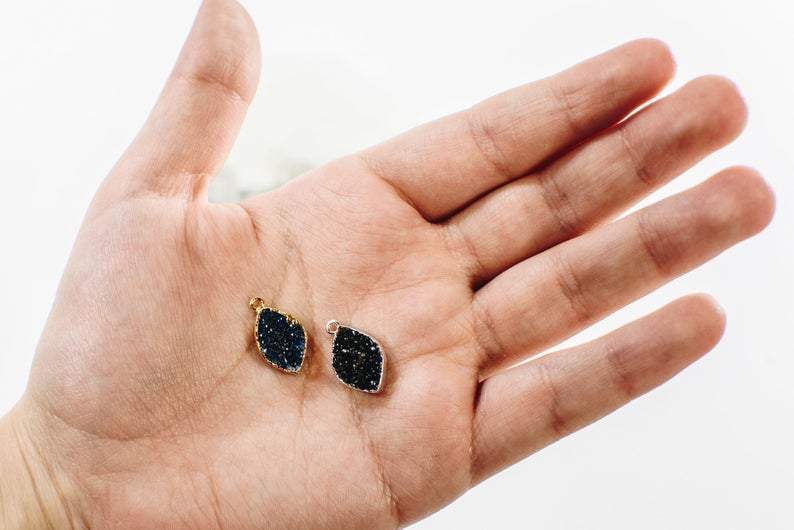 Druzy Marquise Shape  - 2 black ones in a hand