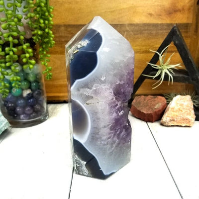 Polished Amethyst Cut Base Cluster with Calcite side view