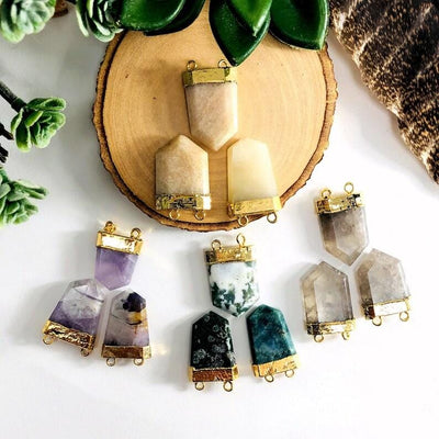 gemstone shields on a table