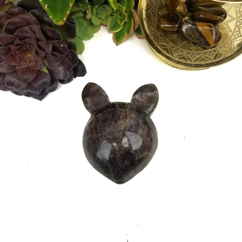 Seven Mineral Stone Mouse head shape on a table