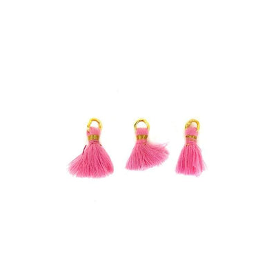 pink tassel with gold accent