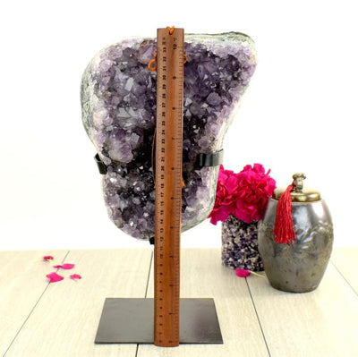 Amethyst Crystal Purple Geode on Metal Stand with ruler in front for size reference