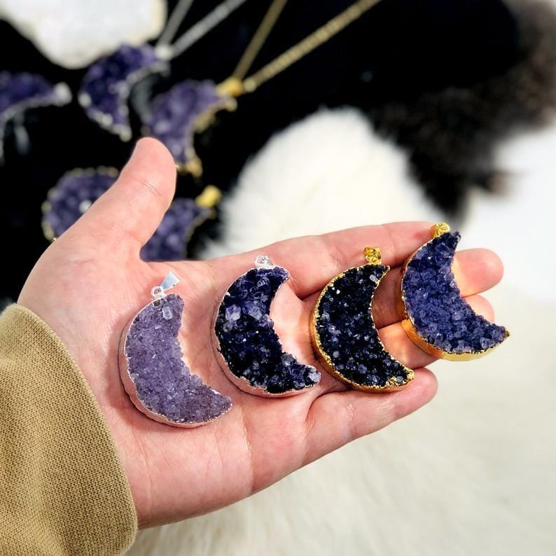 Amethyst Druzy Moon Pendants with Electroplated 24k Gold/Silver Edges in a hand for size