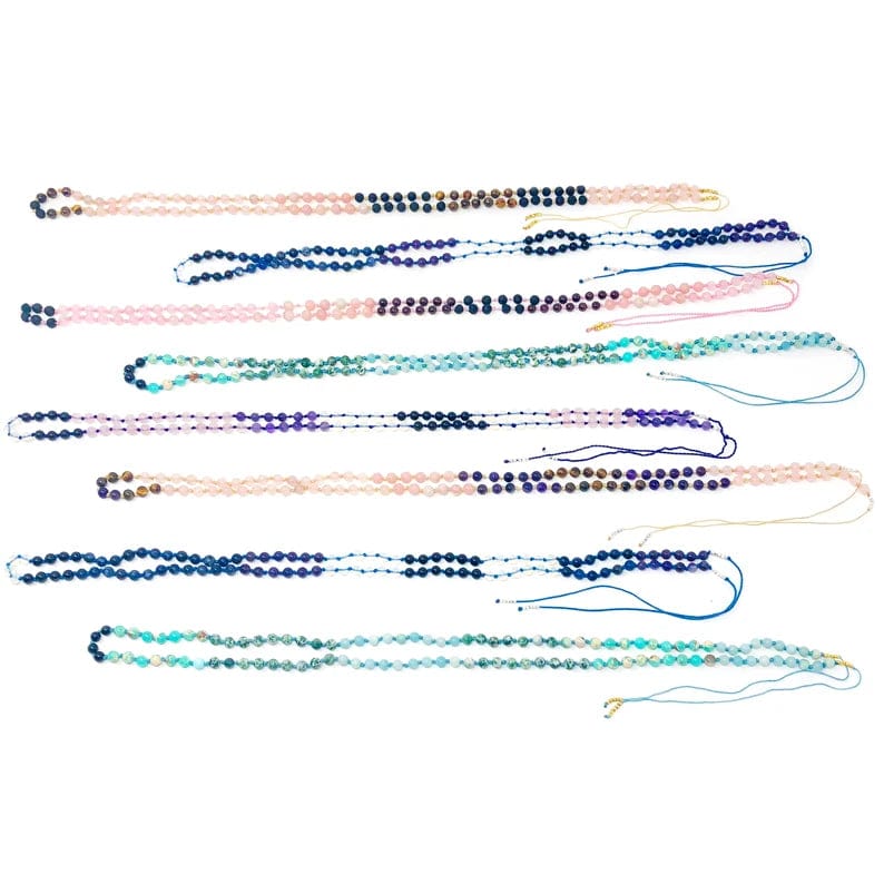 Available assorted stones of Mala Necklace for DIY laid out on a table.