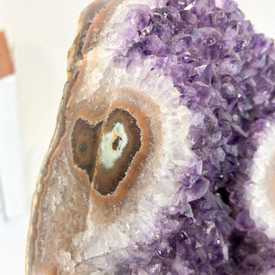 Amethyst Crystal Purple Geode With Stalactite on Metal Stand up close